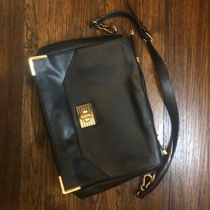 Vince Camuto black purse.